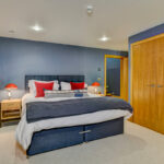068 blue and red bedroom - bed